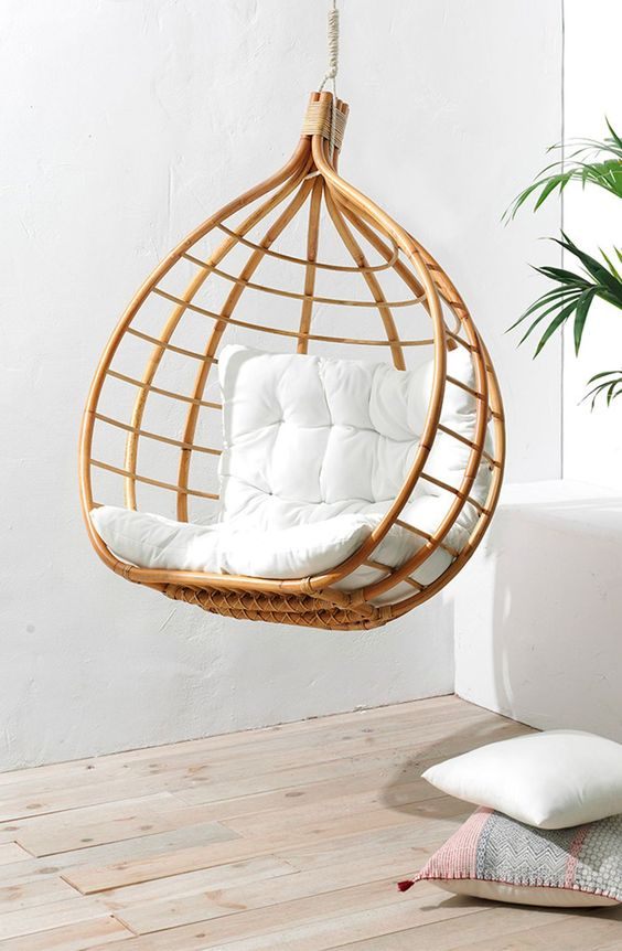 Handcrafted Rattan Hanging Swing Chair Inspired by Modern Tropical Living
